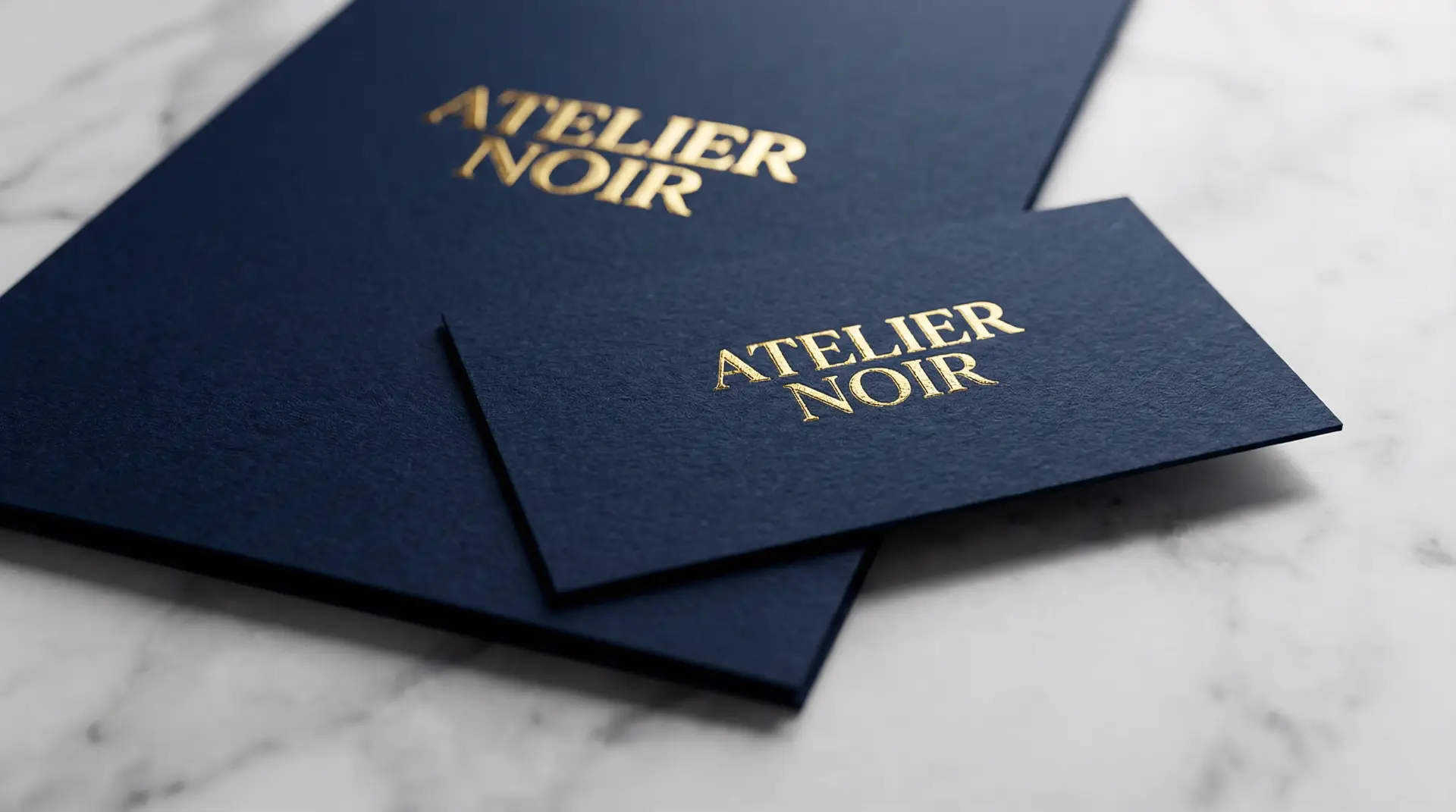 Premium business card and brochure with gold foil embossing for corporate identity.